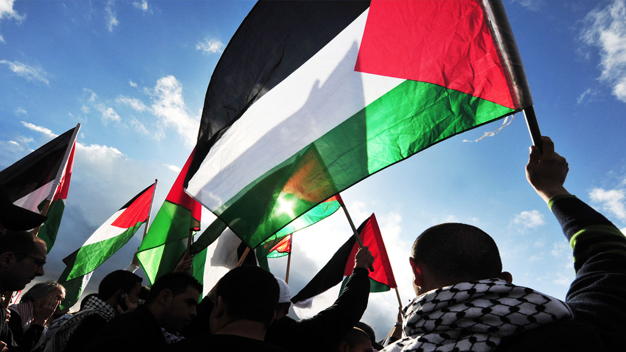 Palestinians with flag